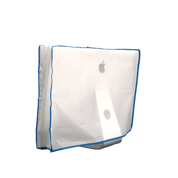 back view of an iMac computer monitor covered by an opaque white slip cover with blue fabric trim